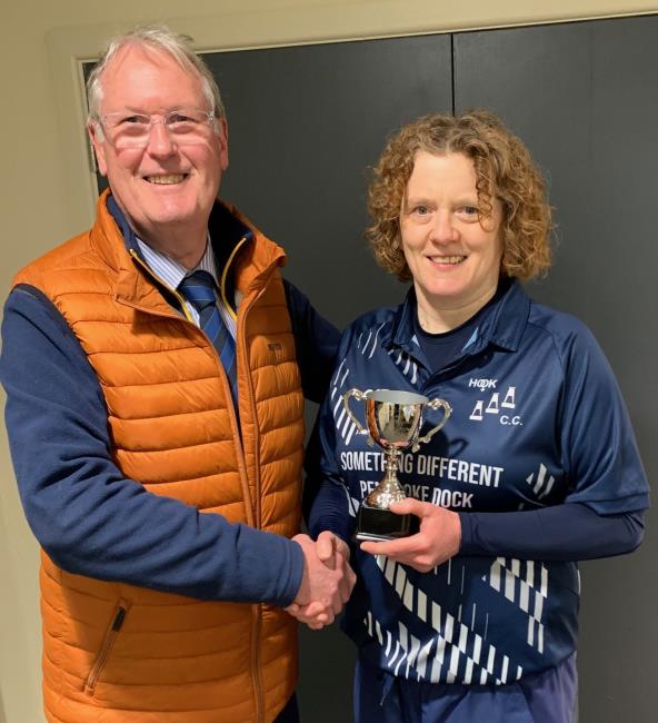 Sam Rossiter receives the champions trophy from Andrew Scott-Davies